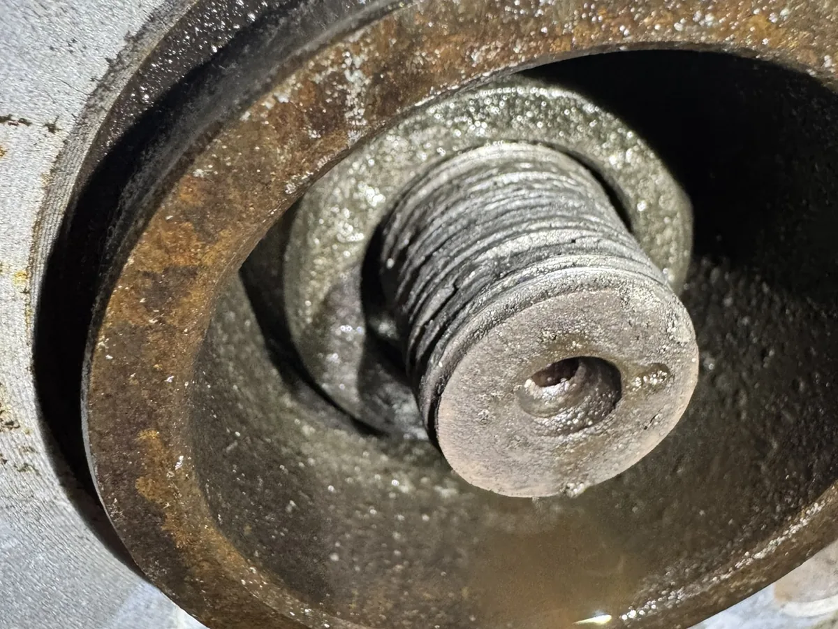 Damaged drive shaft outer CV joint threads inside the hub before replacement at our Royston workshop