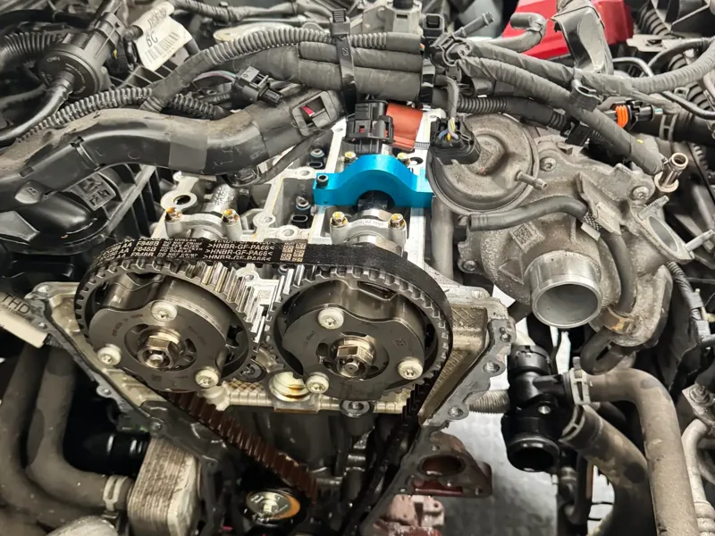 Wet belt replacement on a timing belt in oil engine