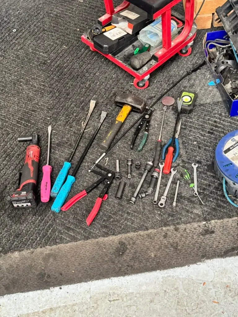 Tools laid out for a Ford Fiesta engine swap
