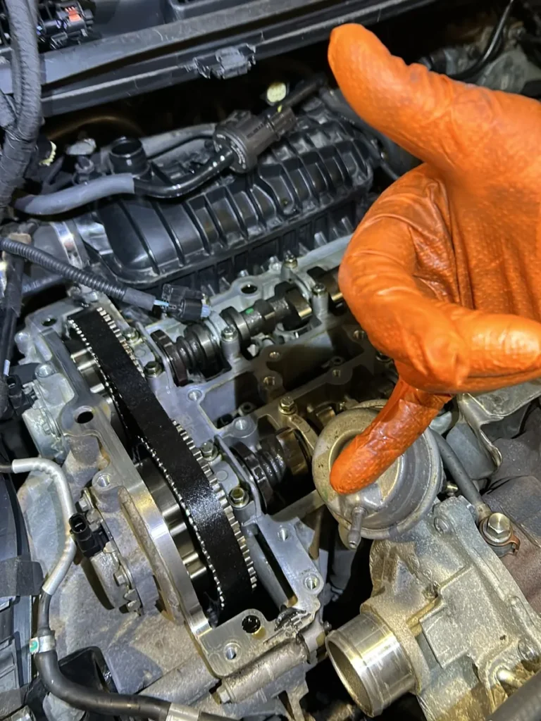 Ford Fiesta 1.0 EcoBoost with the cam cover removed, showing the timing belt and camshafts, during a wet belt replacement at our Swindon workshop