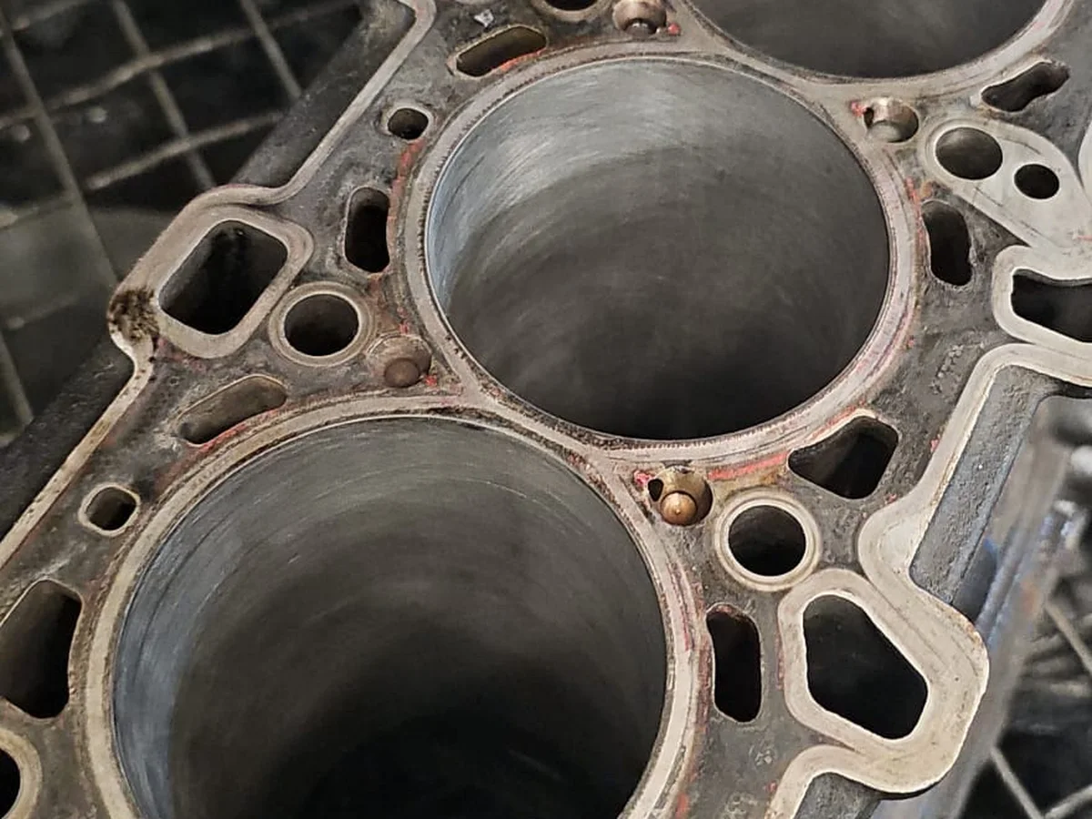 Engine block deck and head gasket with the cylinder head off, at our Royston workshop
