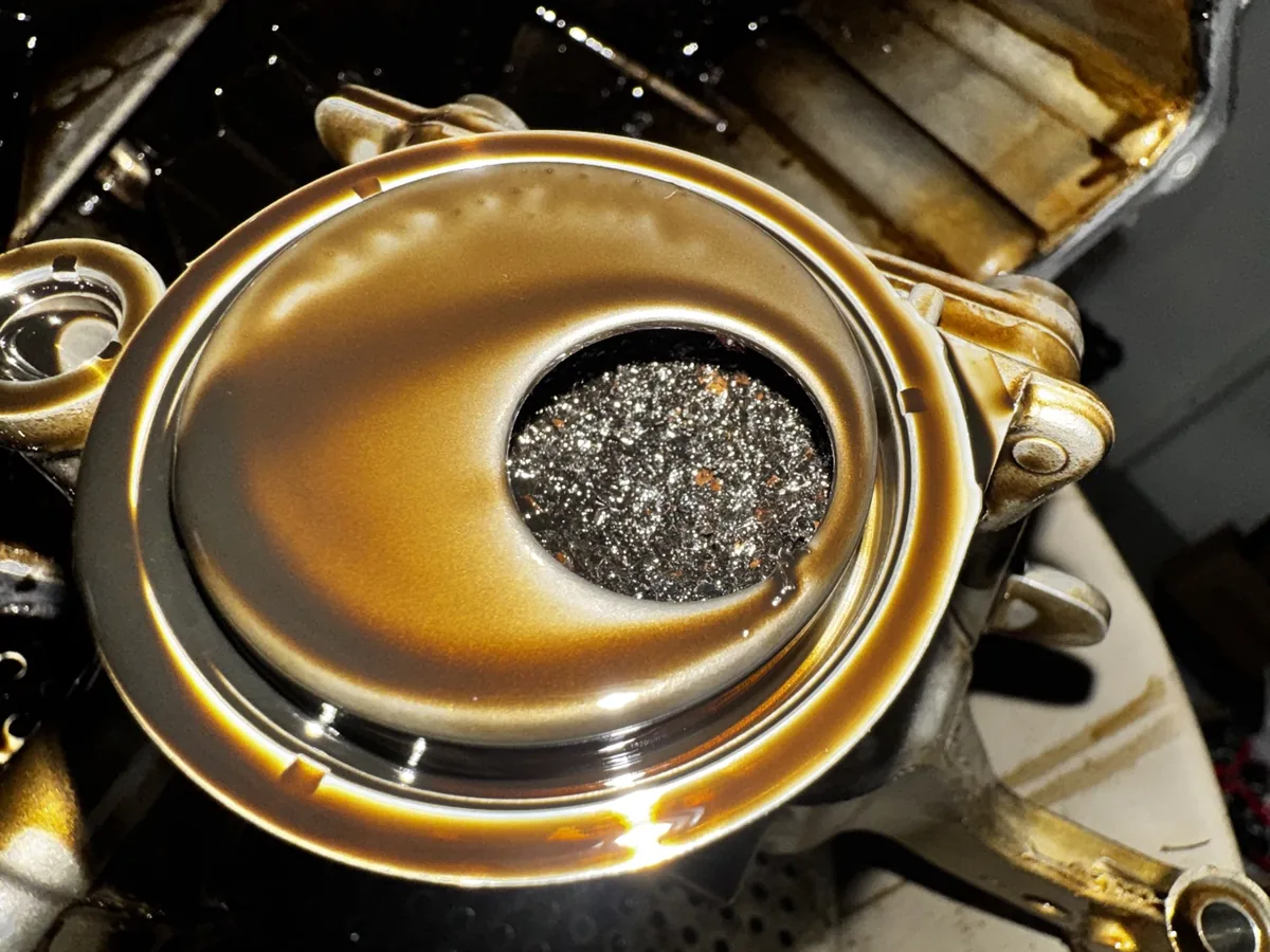 Oil pump strainer blocked with wet belt debris, found at our Royston workshop
