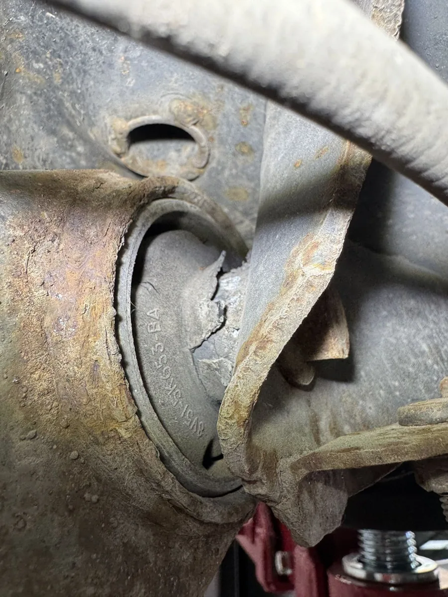Split rubber suspension bush on a car